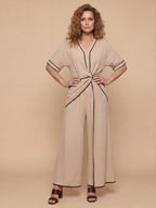 Damen-Jumpsuit mit Wickeloptik und weitem Bein