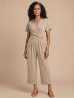 Damen-Jumpsuit in Wickeloptik mit umgeschlagenem Saum