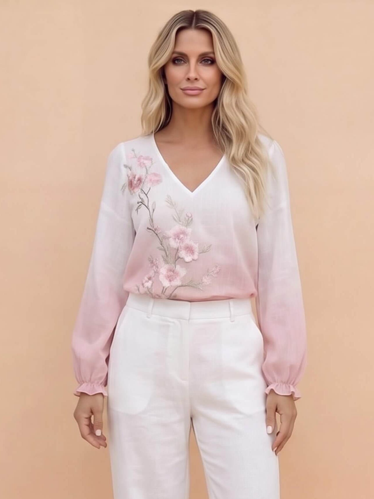 Damenbluse mit Blumenstickerei und V-Ausschnitt